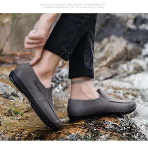 Men waterproof short rain boots non-slip rubber slip-on shoes for outdoor work and rainy days.