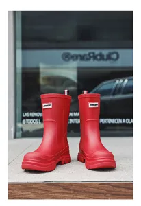 Solid color mid-calf rain boots for women, waterproof slip-on shoes for outdoor camping.
