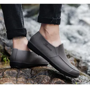 Close-up detail of short waterproof rain shoes, outdoor anti-slip rubber shoes design view.