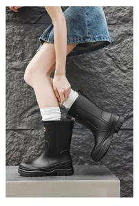 Casual solid color mid-calf waterproof rain boots for women, slip-on rubber shoes for daily use.