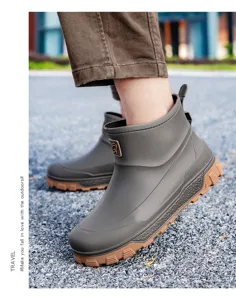Men's waterproof short rain boot detail showing anti-slip rubber outsole and durable material.