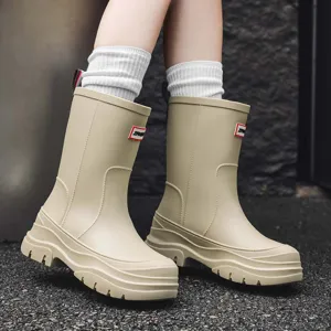 Women solid color mid-calf rain boots, waterproof slip-on chunky platform rain boots for outdoor work.