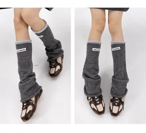 Miu style knit leg warmers for women, autumn winter stacked socks with cloth label.