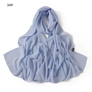 Écharpe longue unie en mousseline bleu clair avec drapé élégant voyage et navettage