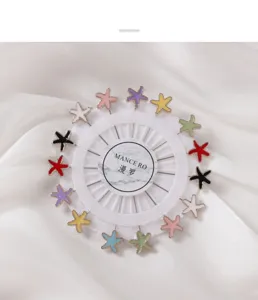 Detailed view of colorful starfish brooch pins arranged in a white wheel for clothing fixing.