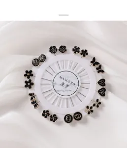 Wheel-mounted black gold floral butterfly brooch pins, decorative scarf positioning pins.
