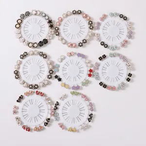 Round wheel display set of decorative floral and heart pins, perfect for hijab and garments.