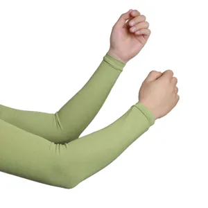 Detailed view of solid color macaron green modal cotton sun protection ice sleeves worn on arms.