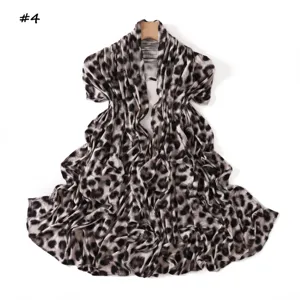 Black and white leopard print long scarf, soft mercerized cotton fabric, stylish accessory.
