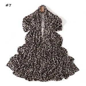 Close-up detail of leopard print mercerized cotton scarf, showing soft texture and high elasticity.