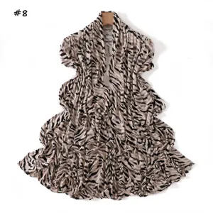 Animal print stretch mercerized cotton long scarf detail view, soft and elastic drape.