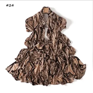 Snake skin print long scarf detail showing soft stretch fabric draped on hanger for fashion look.