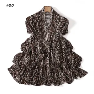 Leopard print stretch cotton jersey scarf detail, soft and flexible fabric texture.