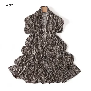 Detailed view of the high-elasticity printed leopard and snakeskin pattern long scarf.