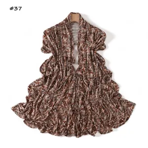 Detailed view of a stylish leopard print long scarf with high elasticity and soft touch.