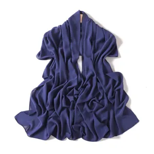 Detailed view of the dark purple chiffon scarf, lightweight and breathable fabric texture.