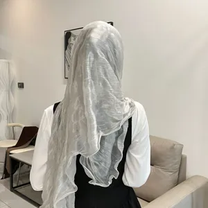 Shimmering grey hijab wrap scarf for women, elegant solid color head cover with soft texture.