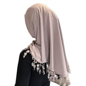 Solid color crystal linen hijab with delicate lace tassel trim, elegant back view presentation.