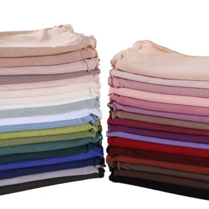 Detailed view of lightweight stretch mesh scarf, breathable candy color fabric close up.