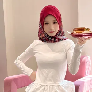 Detailed view of the sweet style plaid mesh pleated headscarf accessory in use.