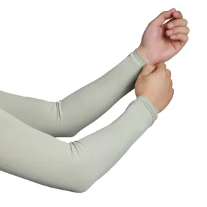 Detailed close-up view of sun protection arm sleeves worn on arms for outdoor UV blocking.