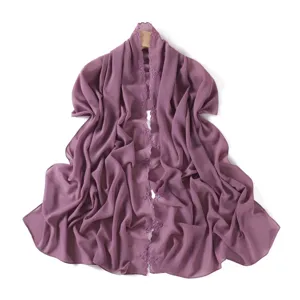Detail view of elegant purple floral embroidered chiffon scarf, showcasing delicate edge work.