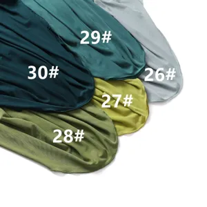 Detailed view of the stretch mesh scarf fabric, showing multiple candy color variants clearly.