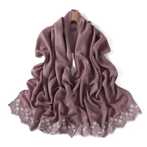 Elegant embroidered floral scarf and shawl with pearlescent luster, perfect for sun protection.