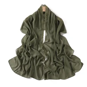 Elegant green chiffon scarf with floral embroidery, lightweight women's shawl and sun protection.