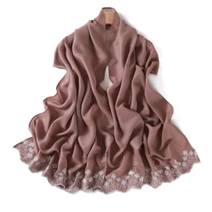 Glossy pearlescent solid color long scarf with delicate white floral embroidery. Elegant shawl.