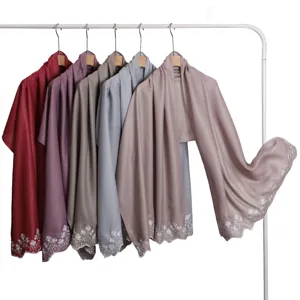 Elegant shimmering solid color long scarf with delicate floral embroidery edge for women.