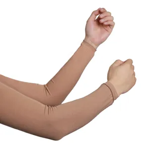 Detailed view of nude color sun protection arm sleeves showing elastic fabric and snug fit.