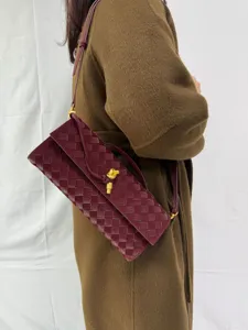 Woven leather shoulder bag vintage long baguette bag elegant evening clutch purse for women