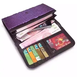 Purple leather long wallet for women with multiple card slots and phone compartment clutch.