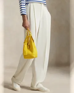 Yellow leather bucket bag for women, luxury style top grain cowhide handbag with top handles.