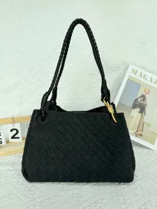 Black woven leather shoulder bag with chic knot detail, large capacity suede tote.