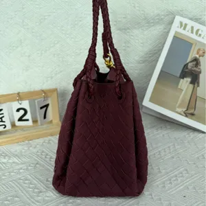 Burgundy woven suede handbag, vintage large capacity shoulder and tote bag detail view.