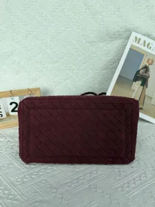 Burgundy faux suede woven shoulder bag, retro large capacity handbag for women stylish daily use.