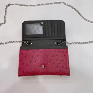 Ostrich pattern baguette shoulder bag for women, chic pink leather flap crossbody purse.