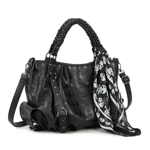 Sac à main en cuir gaufré tête de mort punk noire avec poignée tressée, cabas moto bandoulière.