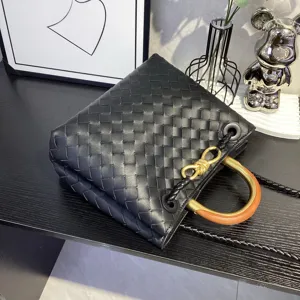 Black woven leather handbag with metal handle stylish tote shoulder bag for women daily use