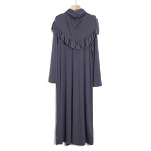 Detail view of the dark grey long sleeve one-piece maxi dress with integrated hijab hood.