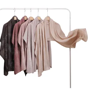 Detailed view of rhinestones studded shimmering chiffon long scarf shawl, elegant multi-color.