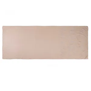 Detailed view of the rhinestone embellished end on the champagne chiffon scarf showing sparkle.