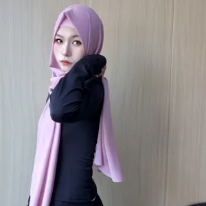 Detailed view of the elegant solid color chiffon hijab scarf and inner cap matching set.