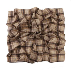 Detailed view of retro British style plaid chiffon square scarf, classic grid print shawl.