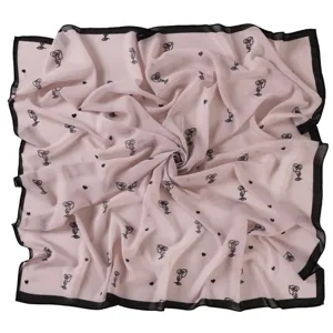 Chic pink chiffon square scarf with black rose and heart prints, stylish black border.