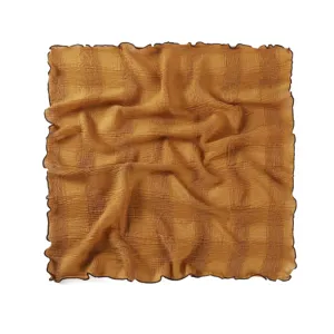 Detail view of the crinkled square scarf showing the soft fabric and lettuce edge.