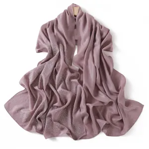 Sparkling rhinestone chiffon scarf detail, elegant dusty pink evening shawl texture.