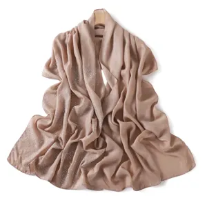 Detailed view of the sparkling rhinestone chiffon scarf, elegant shimmer drape texture.